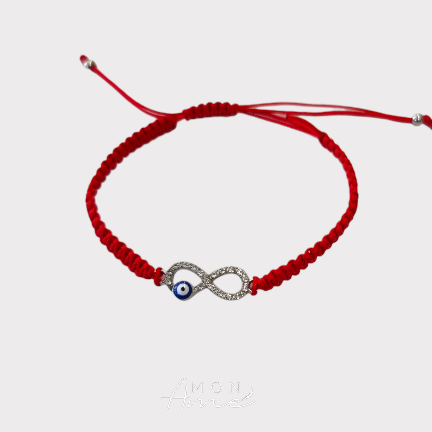 Pulsera roja infinito ojo azul